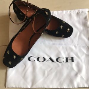 Coach Black suede with prairie print. Unworn.